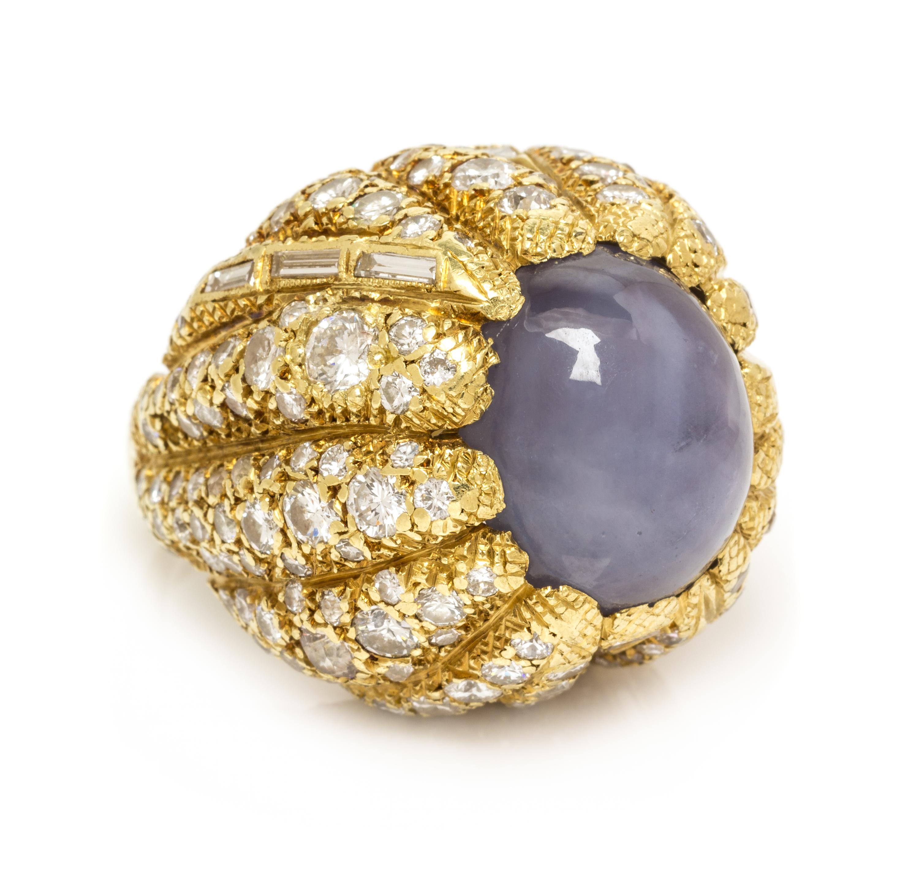 A Yellow Gold, Star Sapphire and Diamond Bombe Ring, 30.40 dwts.