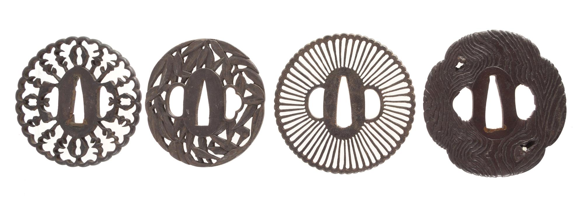 Four Cast Iron Tsubas Height of largest 3 1/4 inches. — 18TH-19TH CENTURY