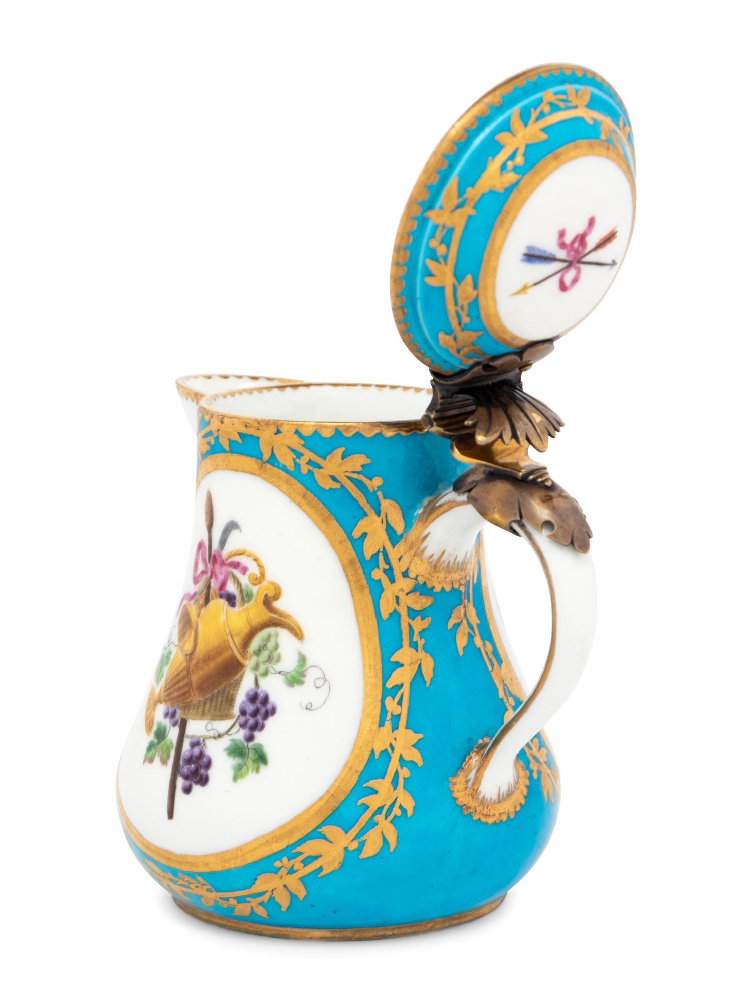 A Sèvres Silver-Gilt Mounted Bleu Céleste Porcelain Hot Milk Jug and Cover ( Pot à Lait 'Duvaux' )