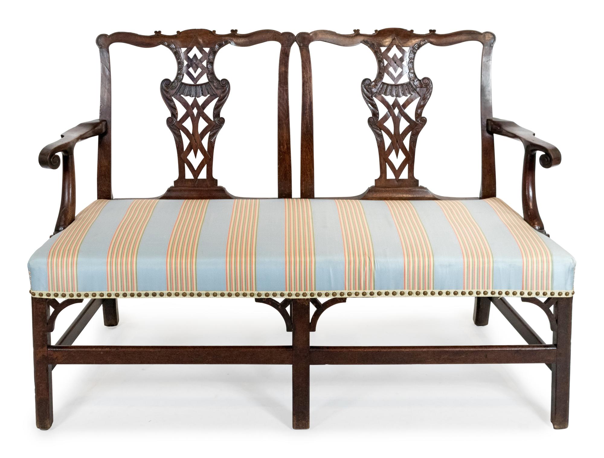 A George III Carved Mahogany Settee