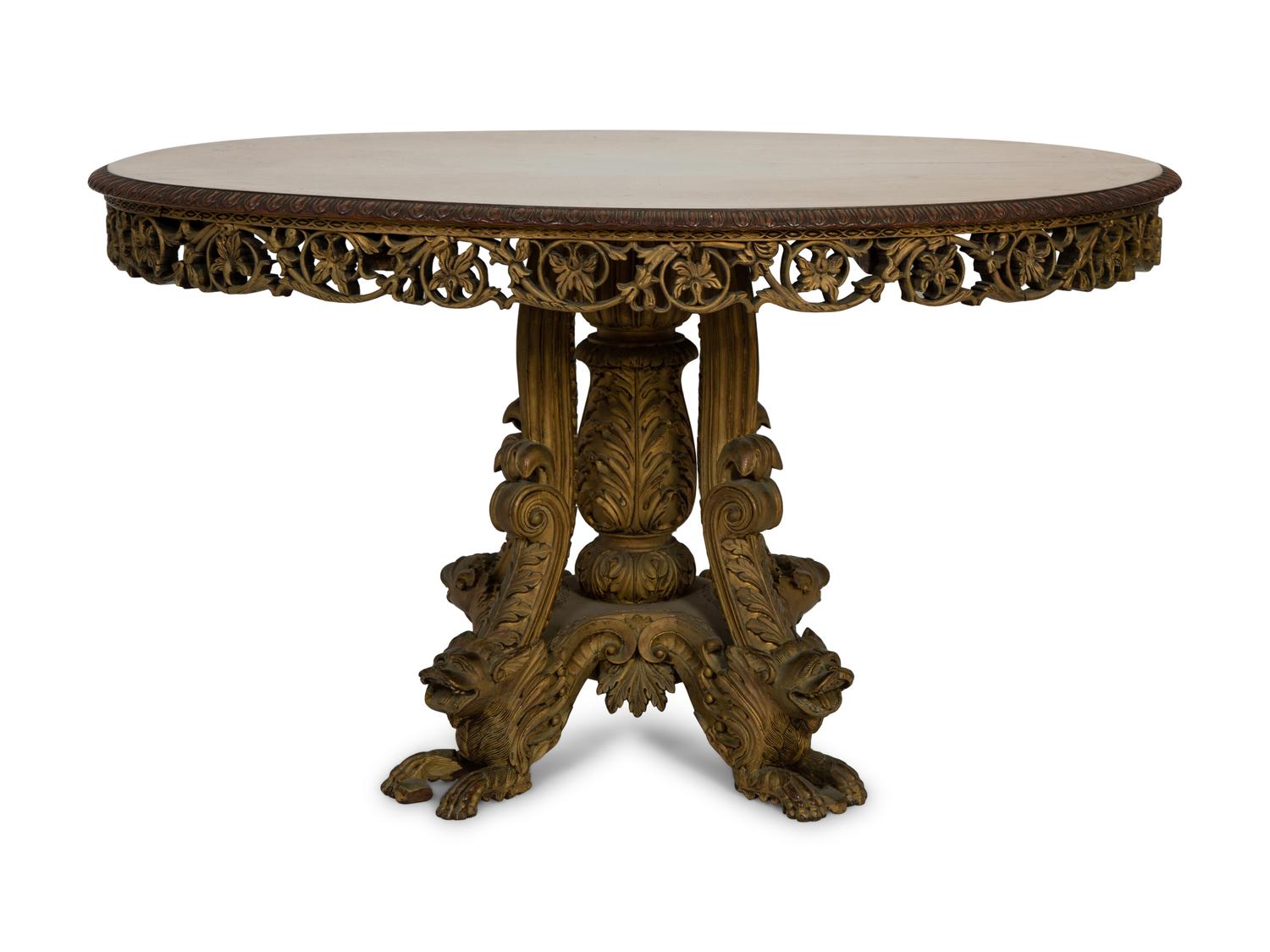 An Anglo-Indian Carved and Parcel Gilt Tilt-Top Table with Lion Form Feet