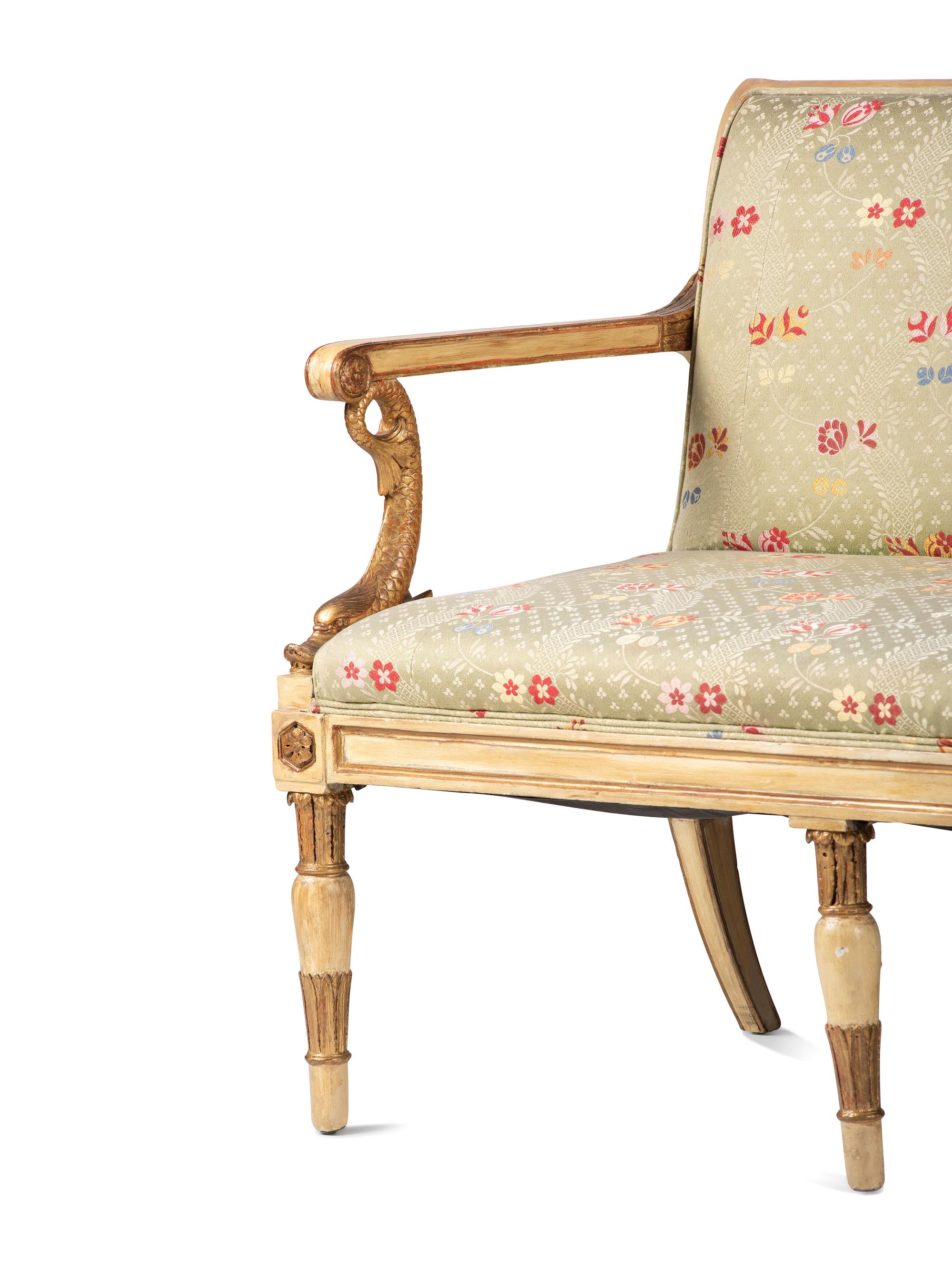 A Louis XVI Style Gold and Cream Paint Decorated Upholstered Settee