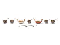 An Assembled Set of Seven Silver and Enameled Salt Cellars with Spoons