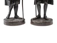 Two French Patinated Bronze Figures of Voltaire and Rousseau