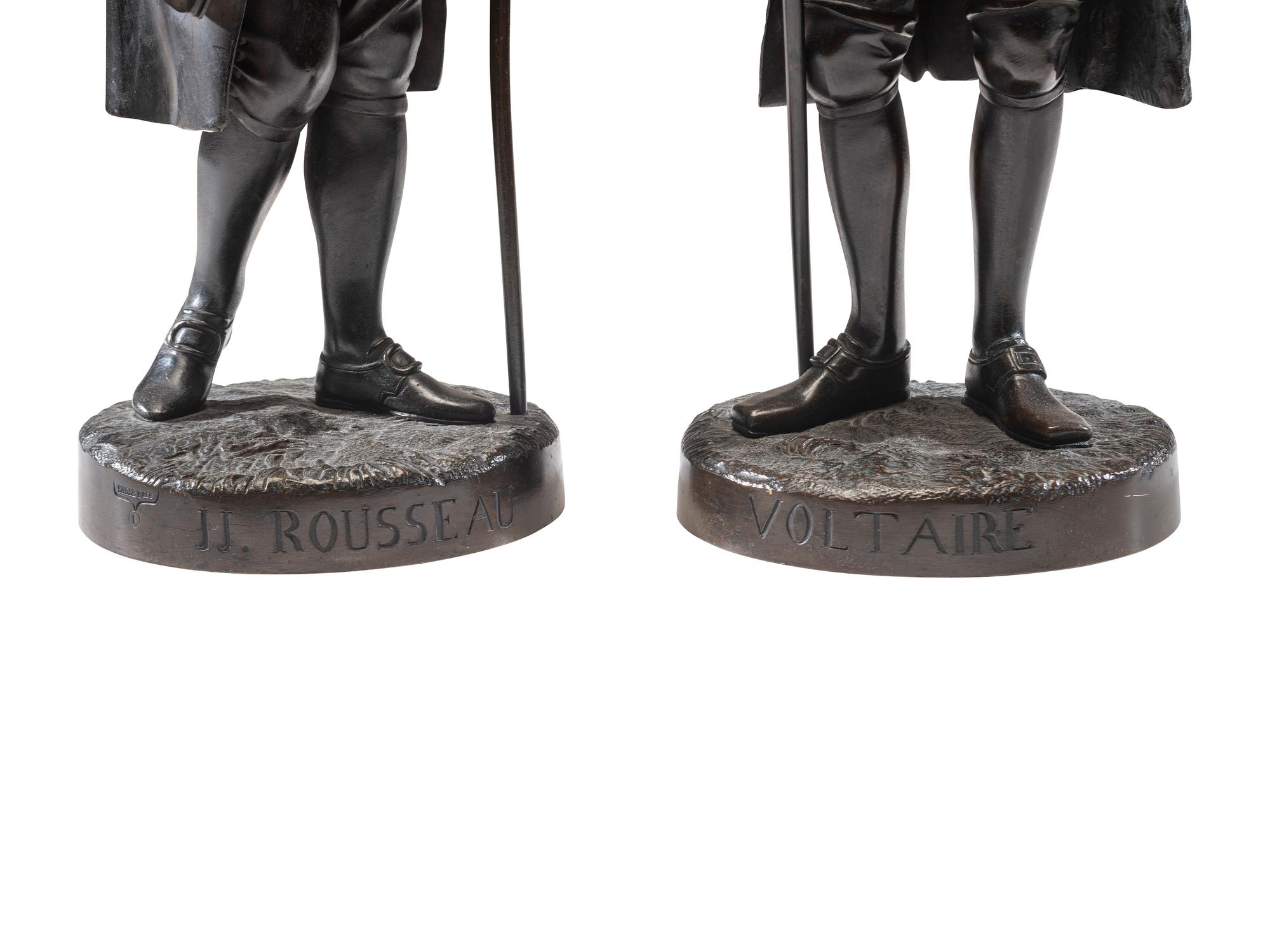 Two French Patinated Bronze Figures of Voltaire and Rousseau