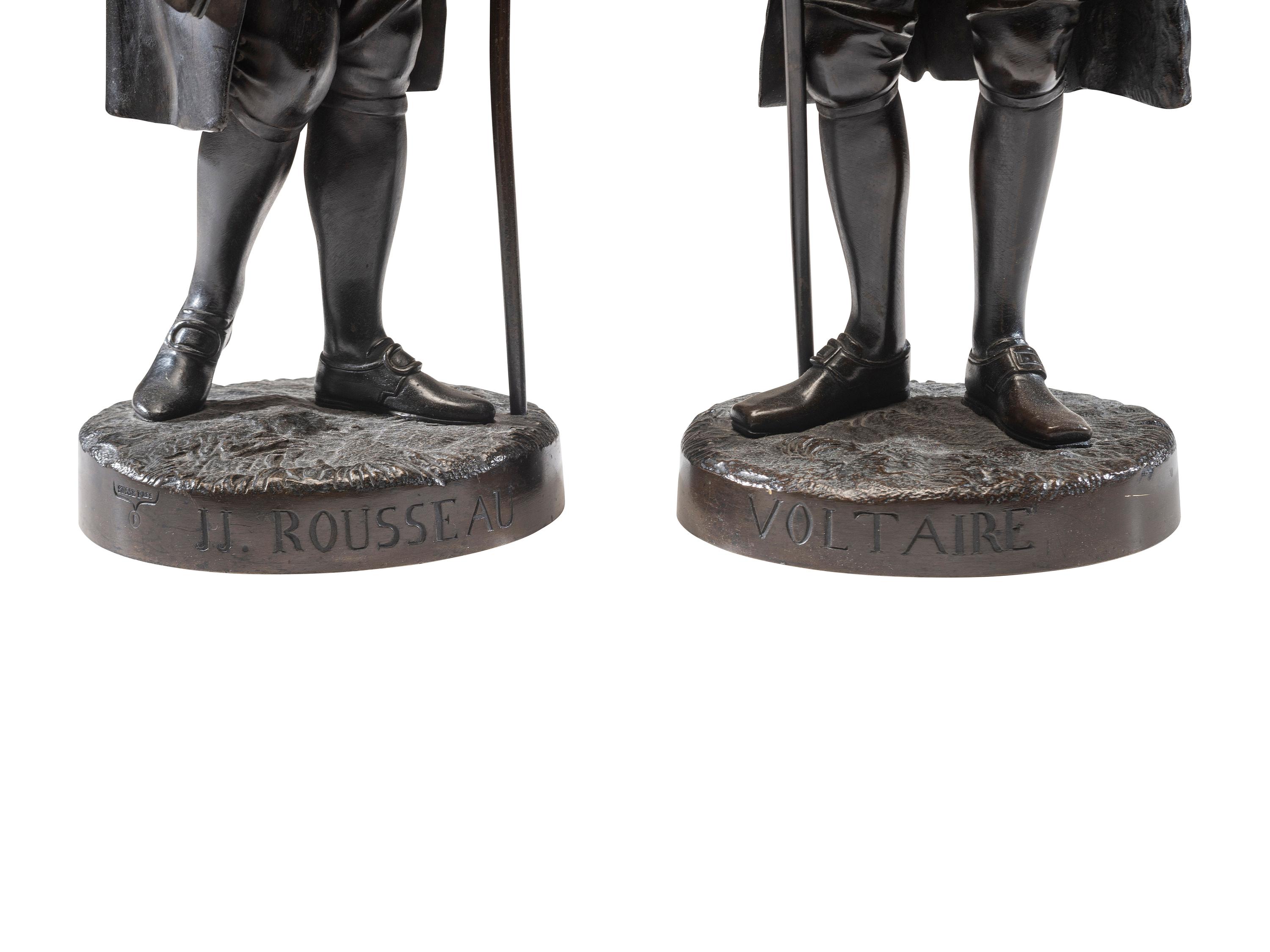 Two French Patinated Bronze Figures of Voltaire and Rousseau
