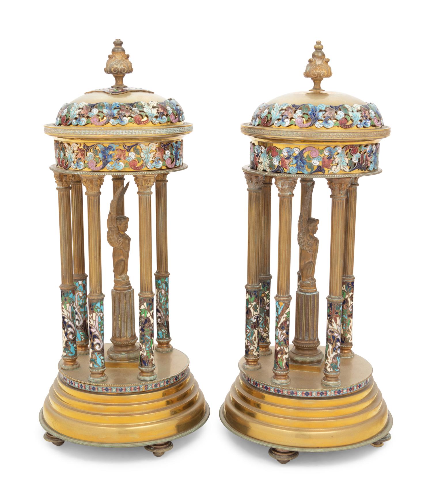 A Pair of French Gilt Bronze and Champlevé Enamel Stands with Interior Sphinxes