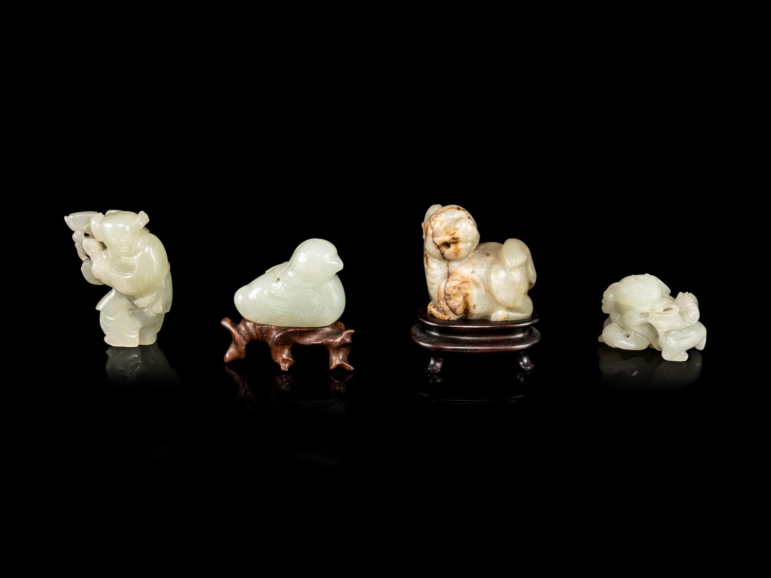 Four Celadon Jade Figures