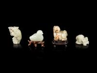 Four Celadon Jade Figures