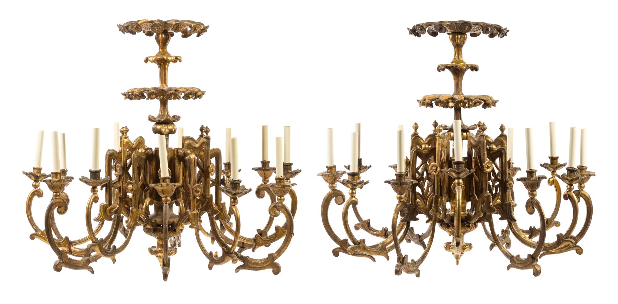 A Pair of Gothic Revival Giltwood Twelve-Light Chandeliers Height 33 x diameter 36 inches. — 19TH CENTURY