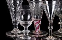 A Collection of Thirteen Assorted Glass Wine and Cordial Stems