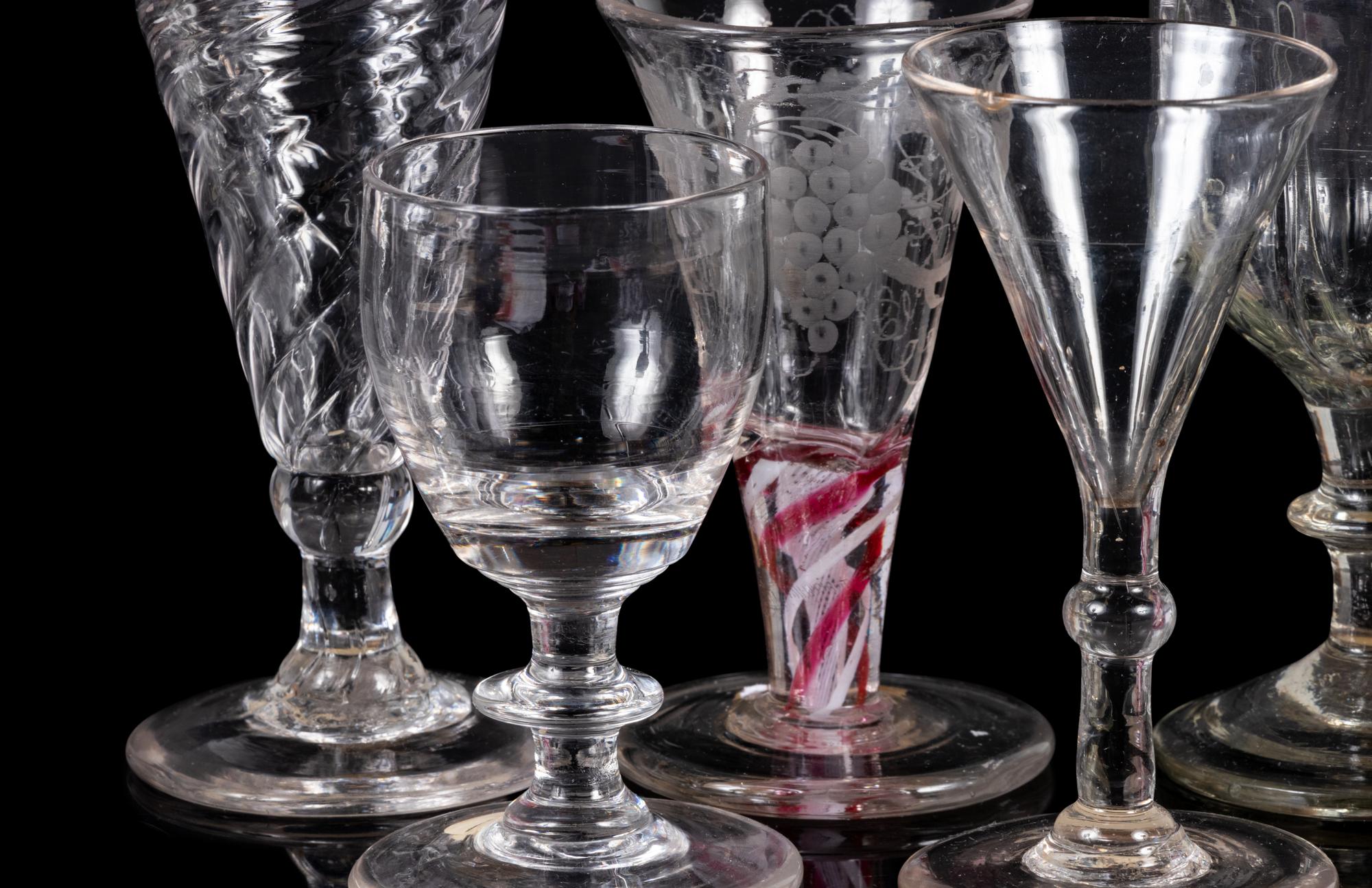 A Collection of Thirteen Assorted Glass Wine and Cordial Stems