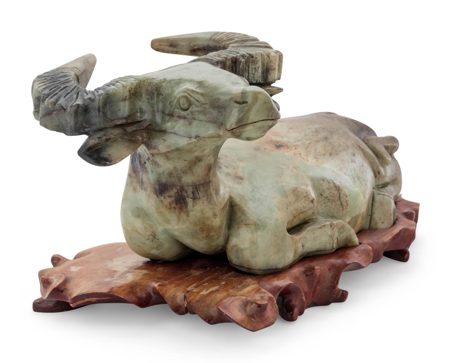 A Chinese Export Carved Hardstone Model of a Bull — 20TH CENTURY