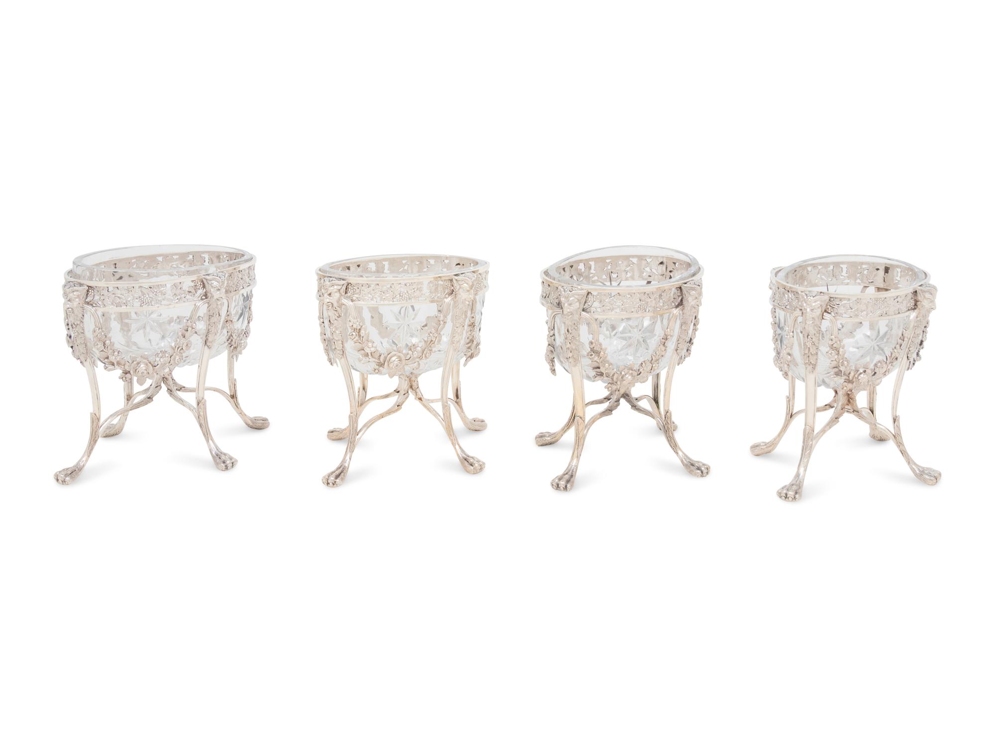 A Set of Four George III Silver and Cut Glass Sweetmeat Bowls