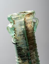 A Roman Pale Blue Glass Double Unguentarium