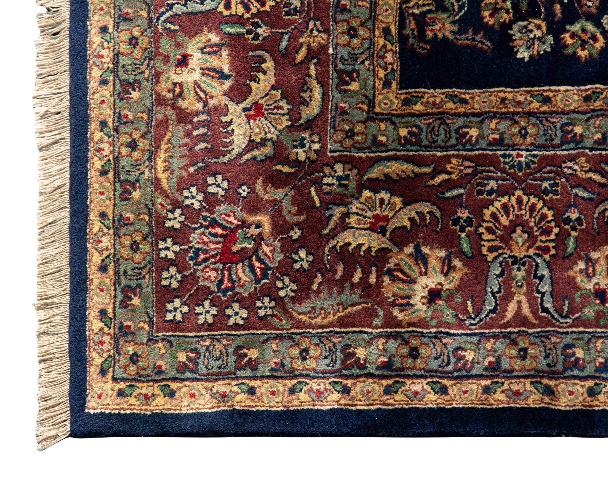 An Indian Persian Design Wool Rug — 20th Century