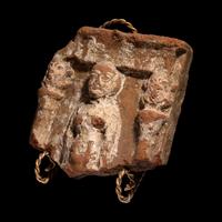 An Egyptian Terracotta Fragment with Concubine Flanked by Bes-Shaped Columns