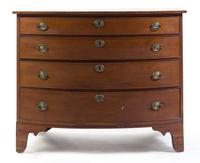 An American Walnut Bowfront Chest of Drawers Height 33 1/2 x width 41 1/2 x depth 22 3/8 inches.
