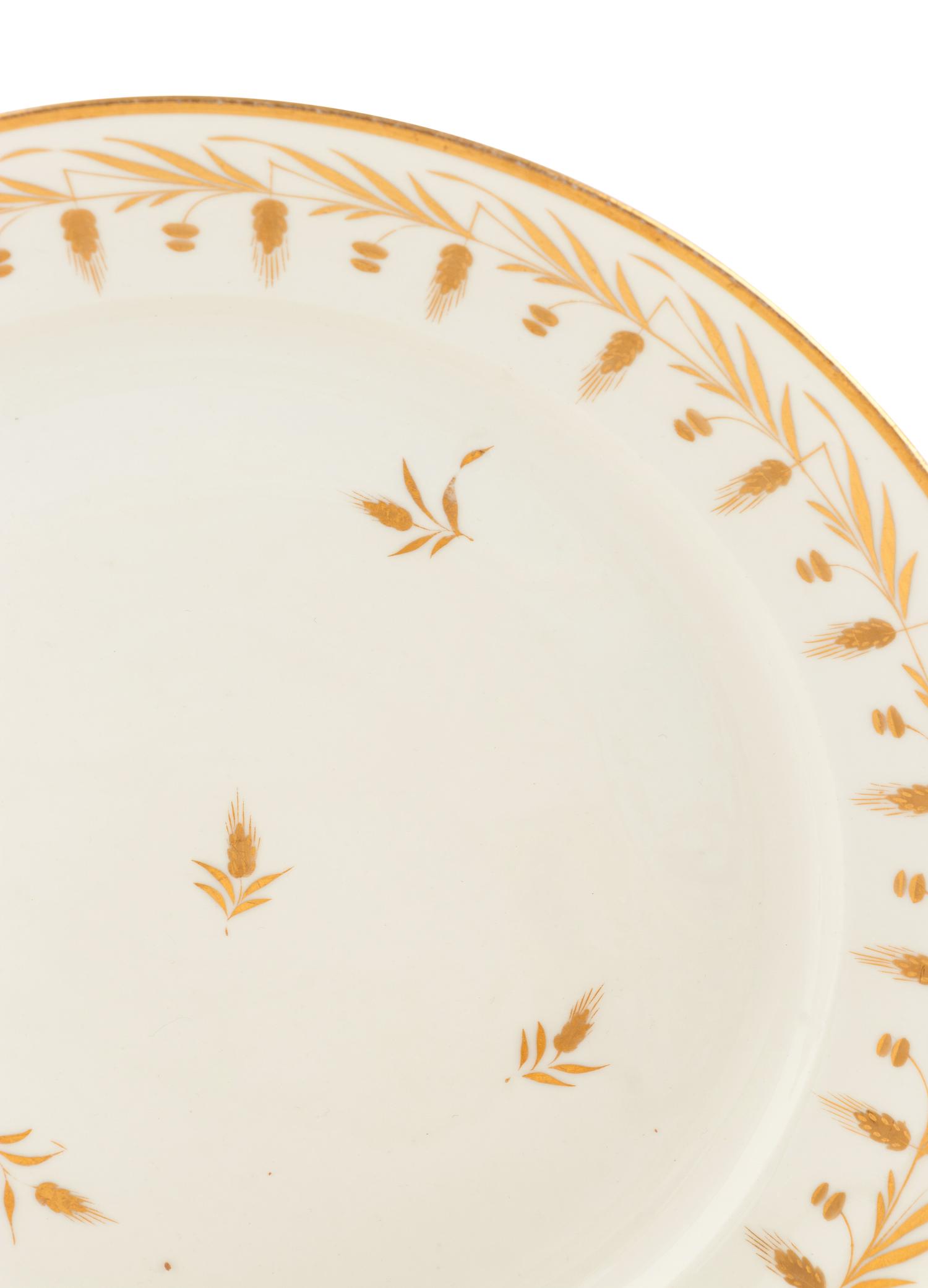 A Parcel-Gilt Porcelain Dinner Service