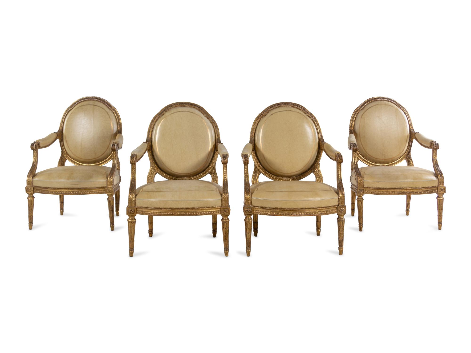 A Set of Four Louis XVI Giltwood Fauteuils