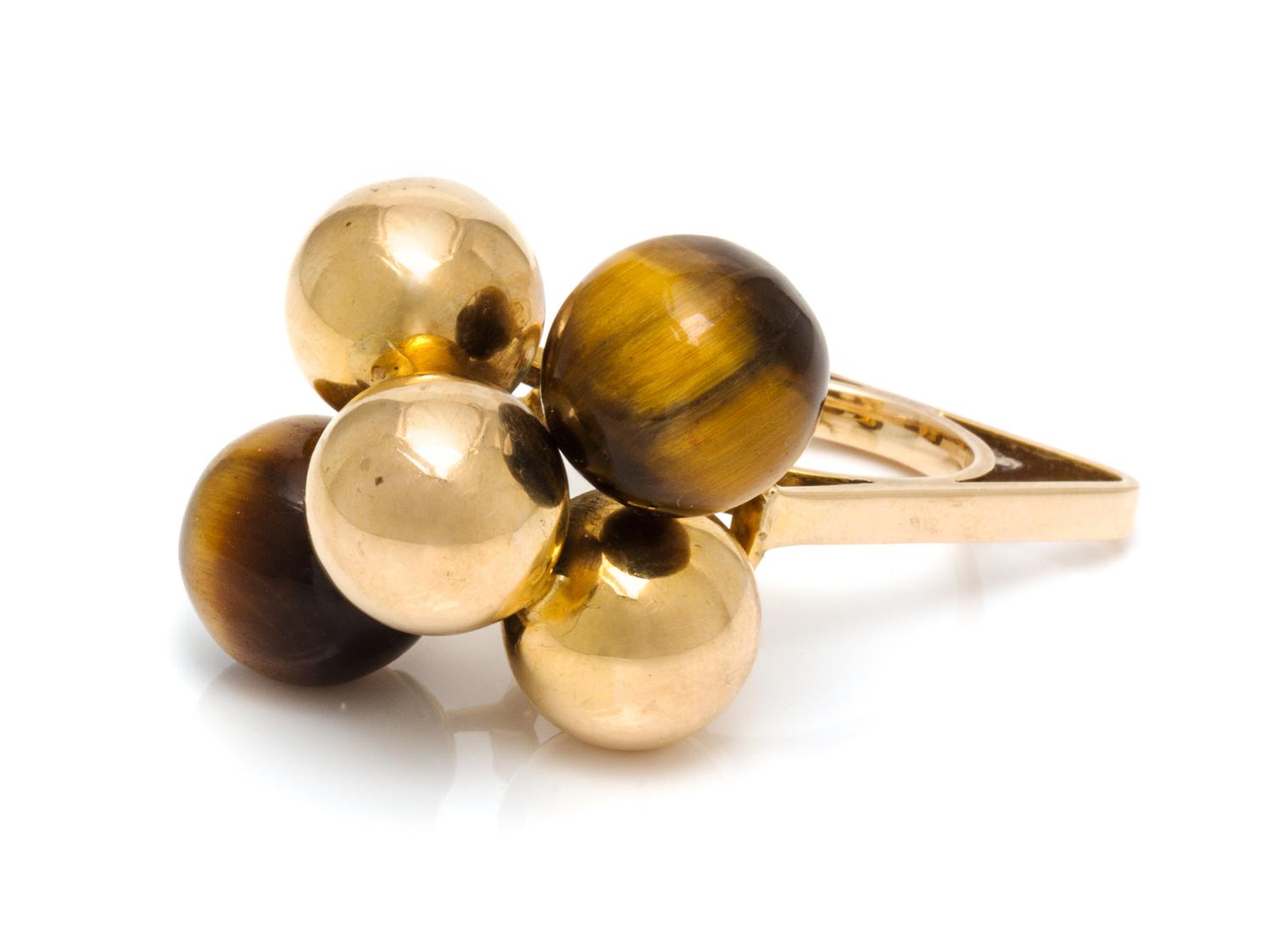 A Modernist Yellow Gold and Tiger's Eye Ring, 9.50 dwts.