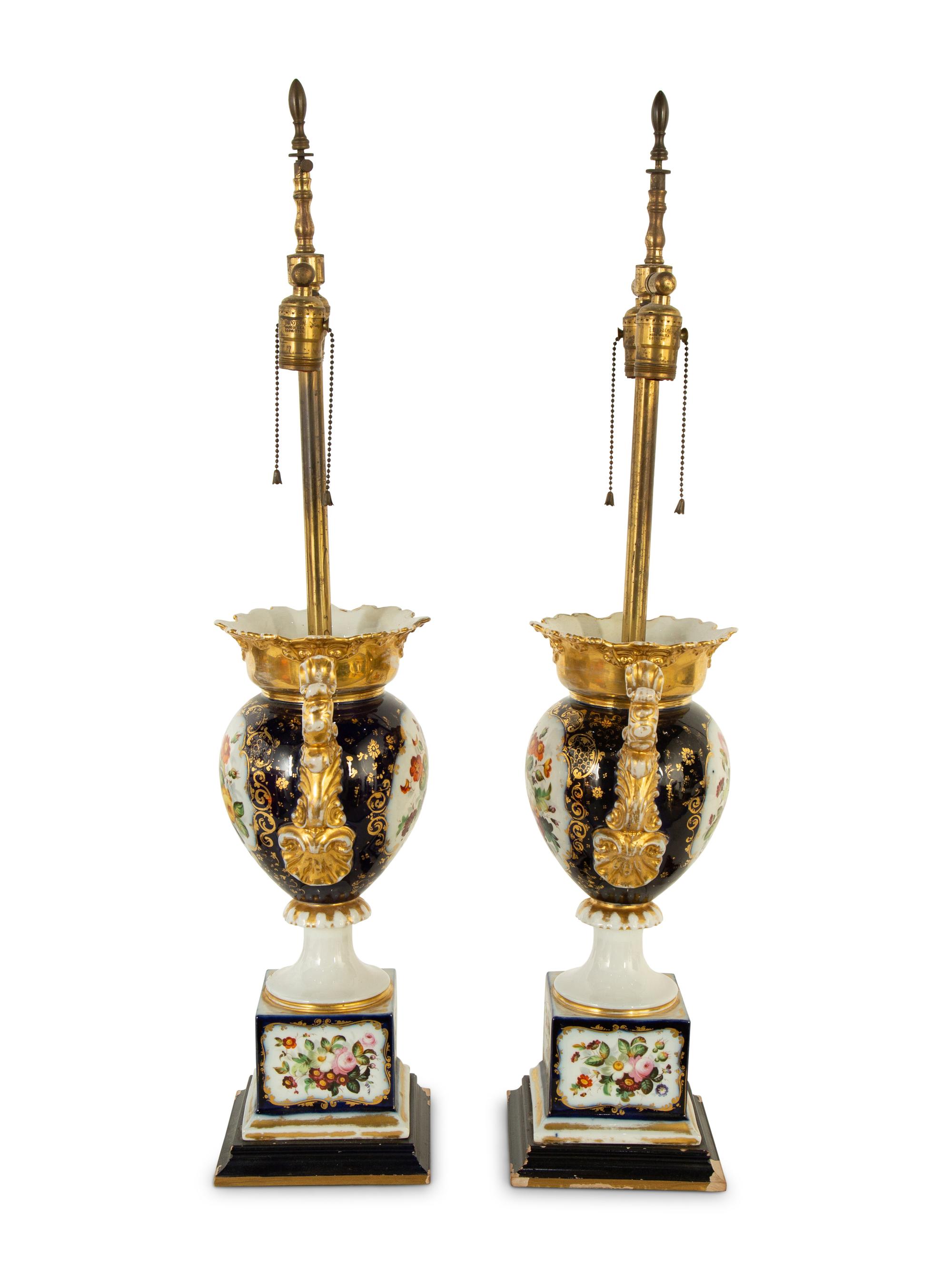 A Pair of French Porcelain Urns Mounted as Lamps