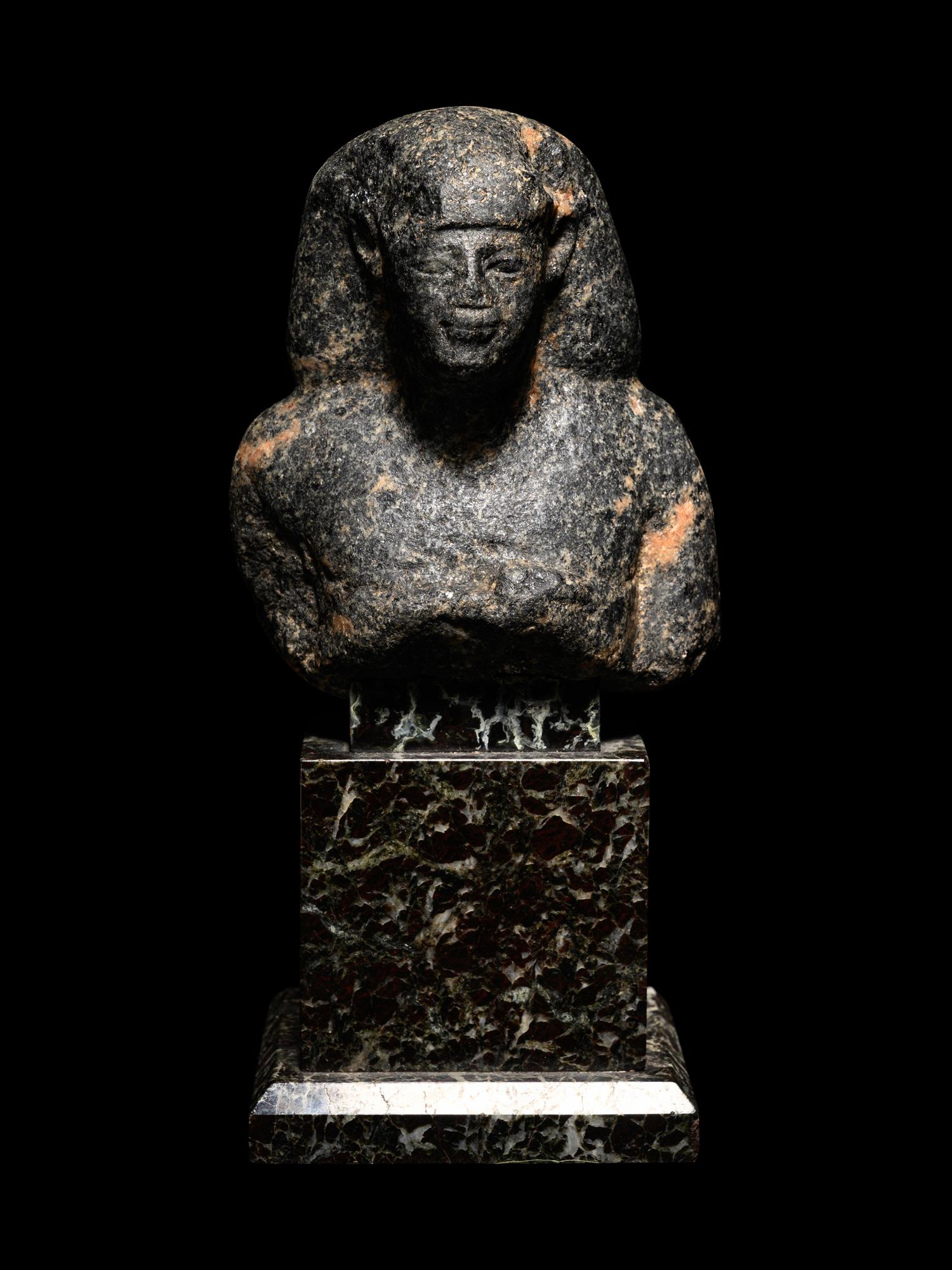 An Egyptian Granite Bust of a Man