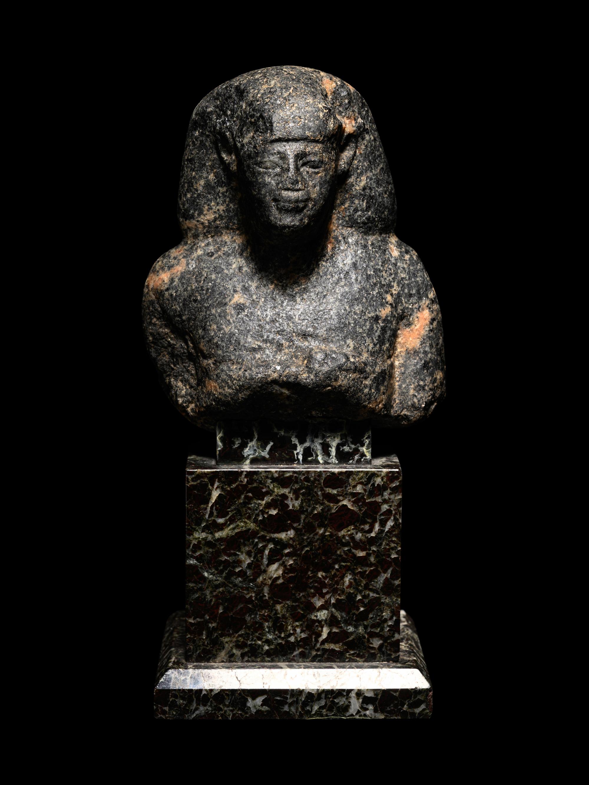 An Egyptian Granite Bust of a Man