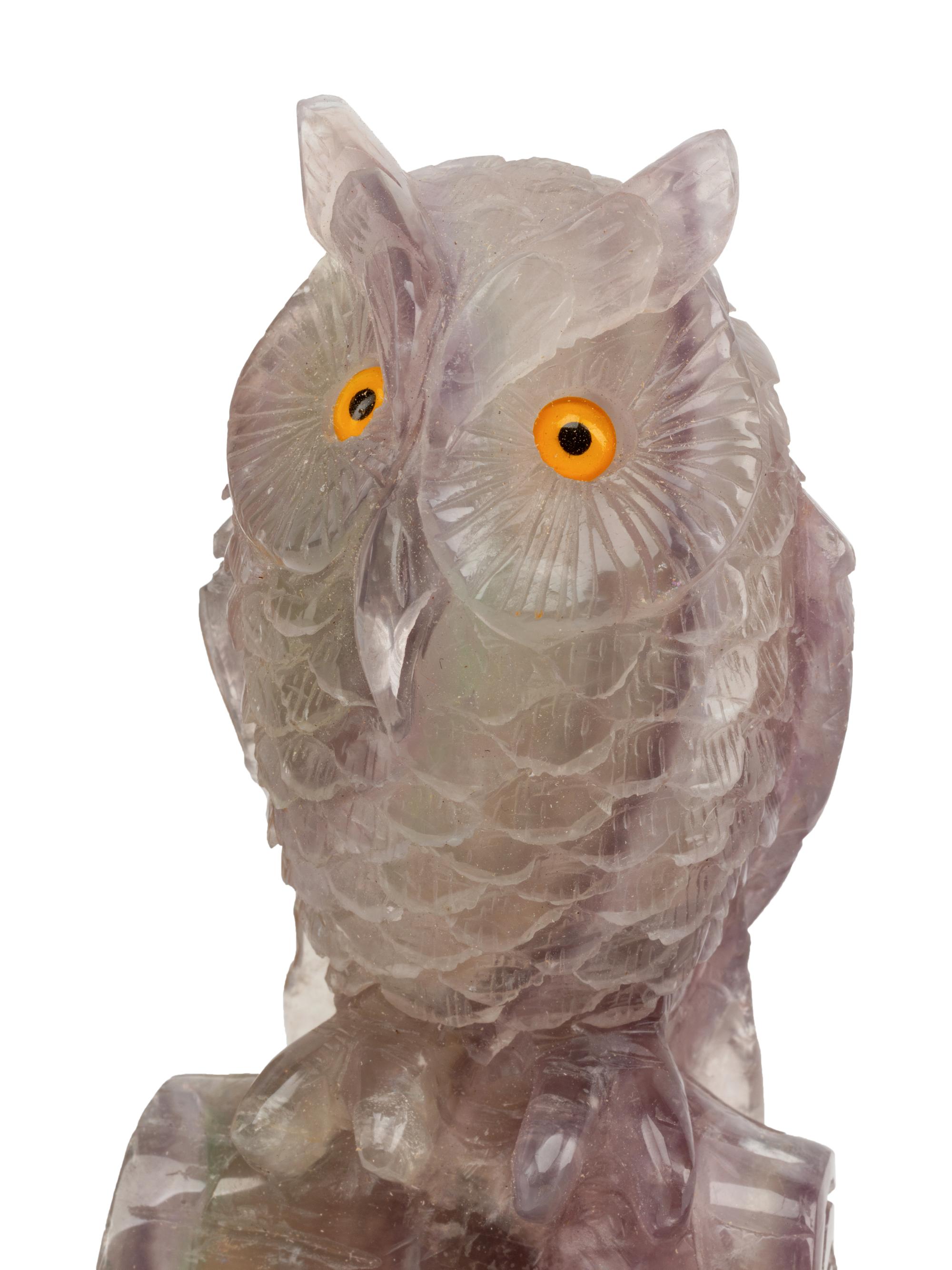 A Pair of Carved Amethyst Owls with Carved Wood Bases