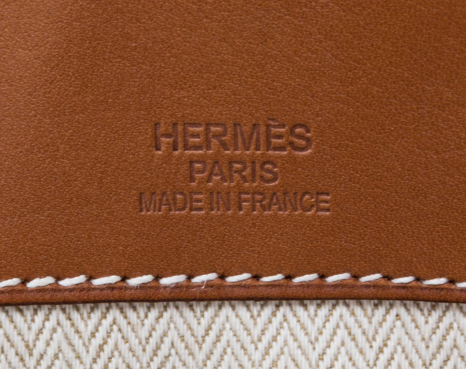 An Hermes Ecru Canvas and Fawn Barenia Calfskin Caleche-Express Medium Tote, 15.3" 14.1" 7.8".