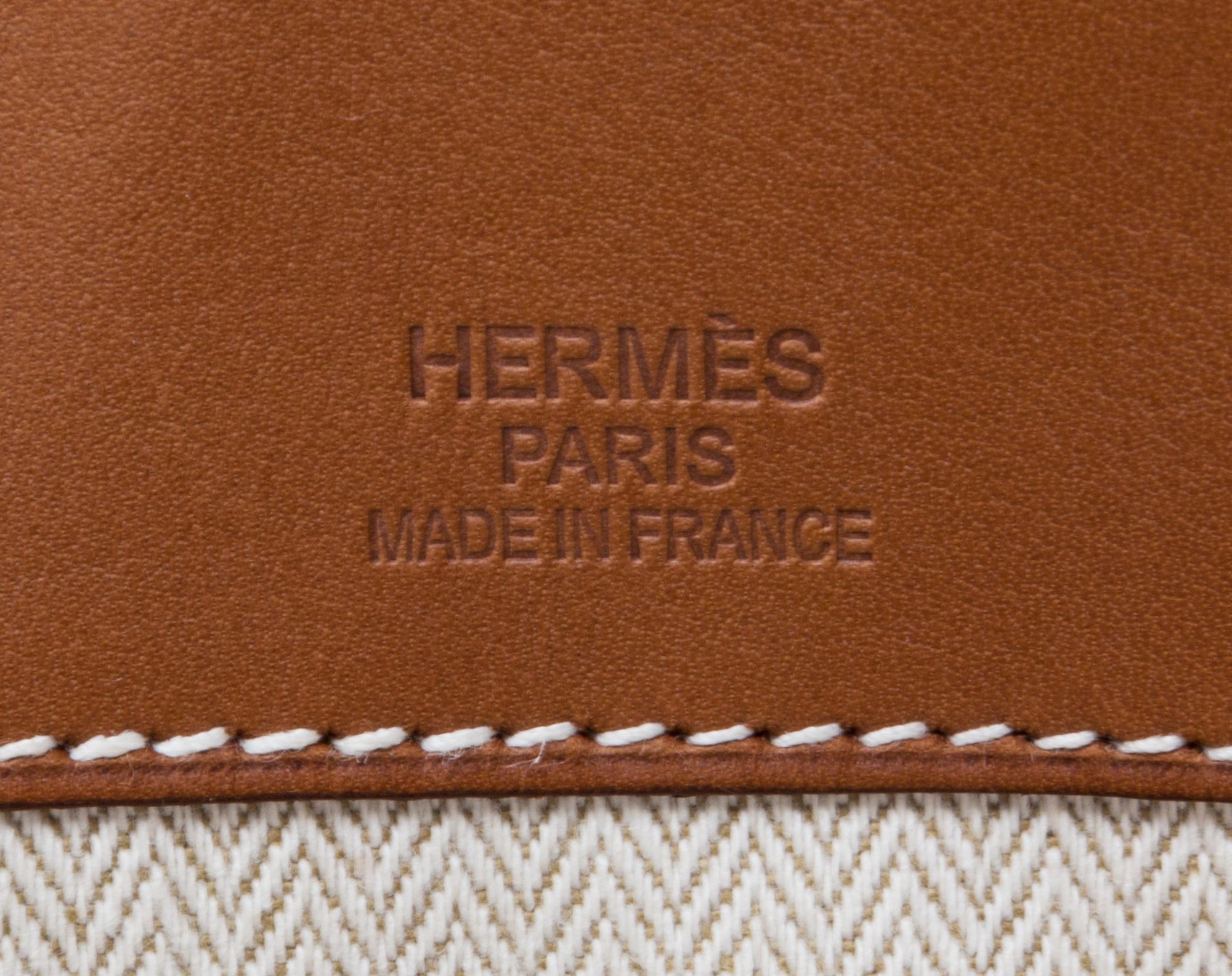 An Hermes Ecru Canvas and Fawn Barenia Calfskin Caleche-Express Medium Tote, 15.3" 14.1" 7.8".