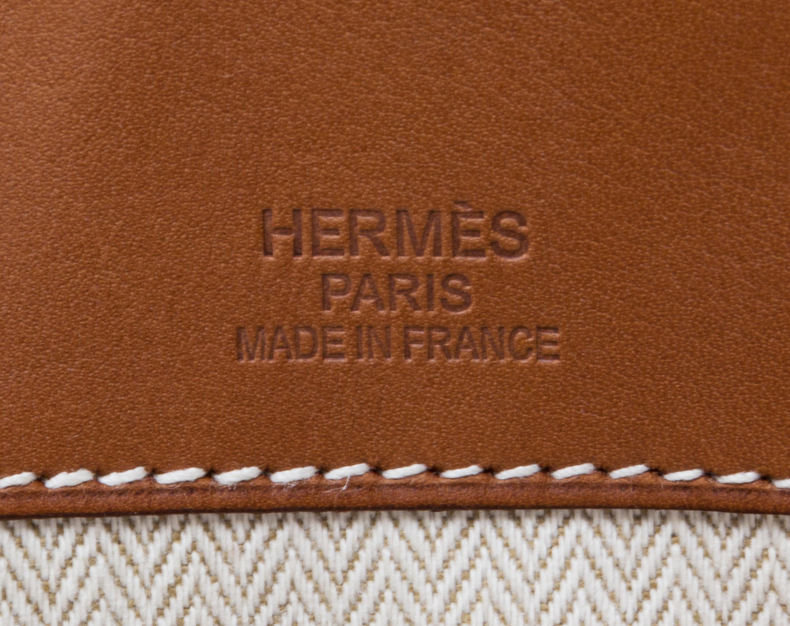 An Hermes Ecru Canvas and Fawn Barenia Calfskin Caleche-Express Medium Tote, 15.3" 14.1" 7.8".