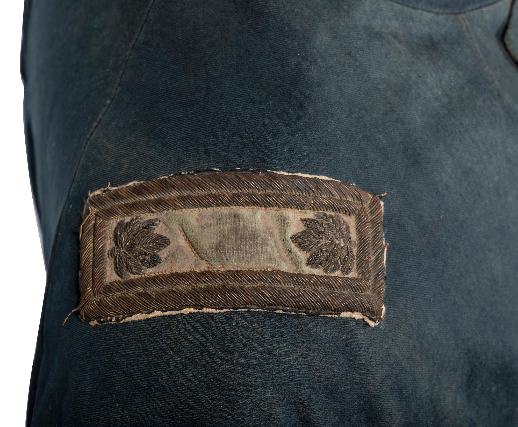 A collection of items identified to Lieutenant Colonel Jonathan Biggs, 123rd Illinois Infantry, “Wilder’s Brigade,” highlighted by bullet-struck frock coat and vest worn during the assault on Selma, Alabama. 2 April 1865.