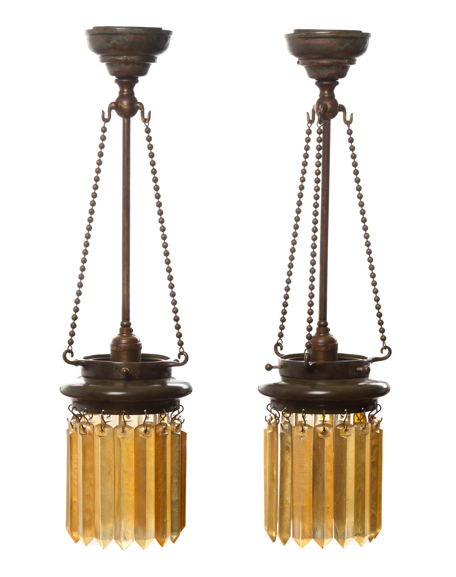A Pair of Tiffany Studios Favrile Glass and Bronze Lanterns Height overall 24 inches.
