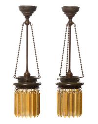 A Pair of Tiffany Studios Favrile Glass and Bronze Lanterns Height overall 24 inches.