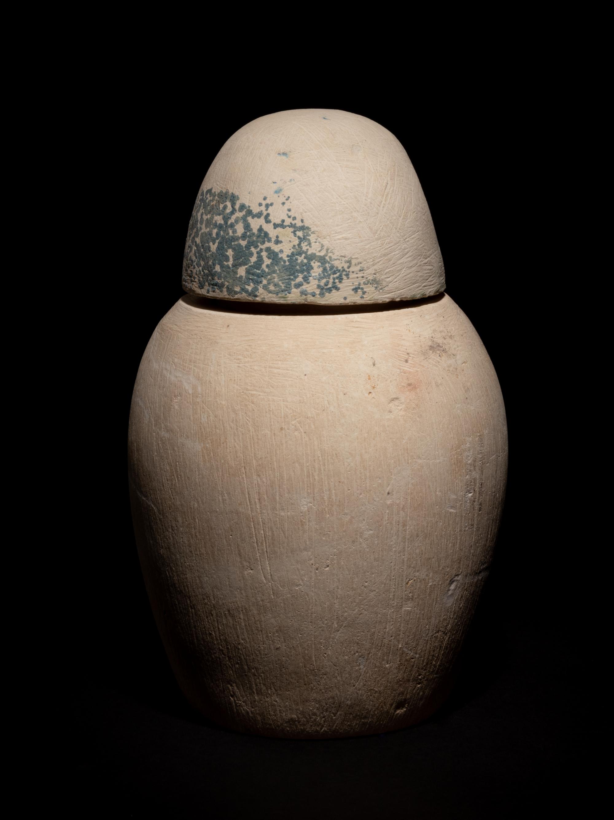 A Set of Four Egyptian Painted Limestone Canopic Jars of the Sons of Horus