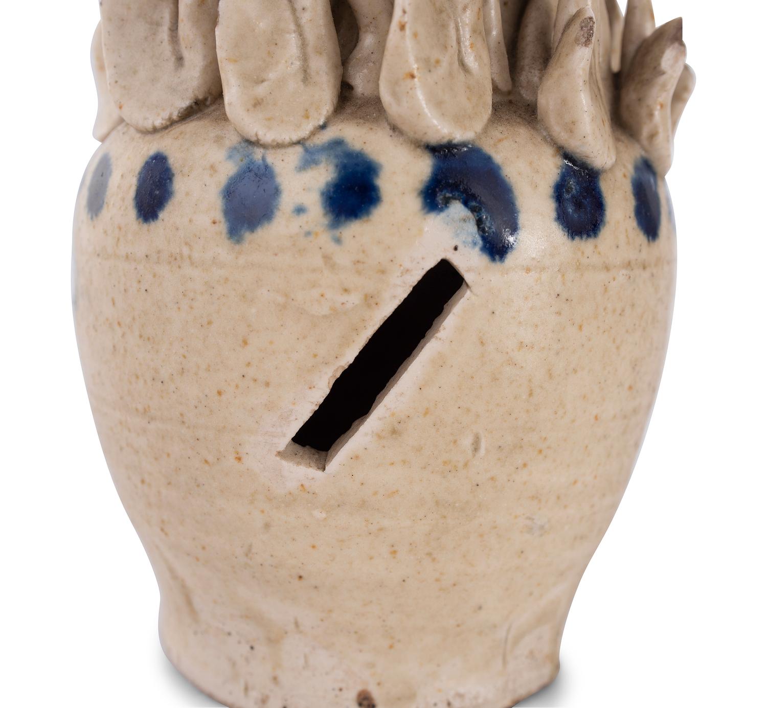 A Pair of Cobalt Decorated Stoneware Puzzle Banks
