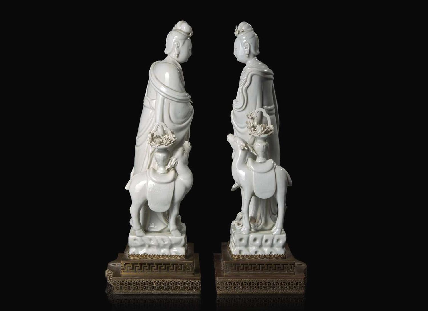 A pair of Chinese Blanc de Chine Figures of Meiren with Deer, Xu Yunlin Zhi impressed mark 德化窯仕女仙鹿瓷塑一對 許雲林製款