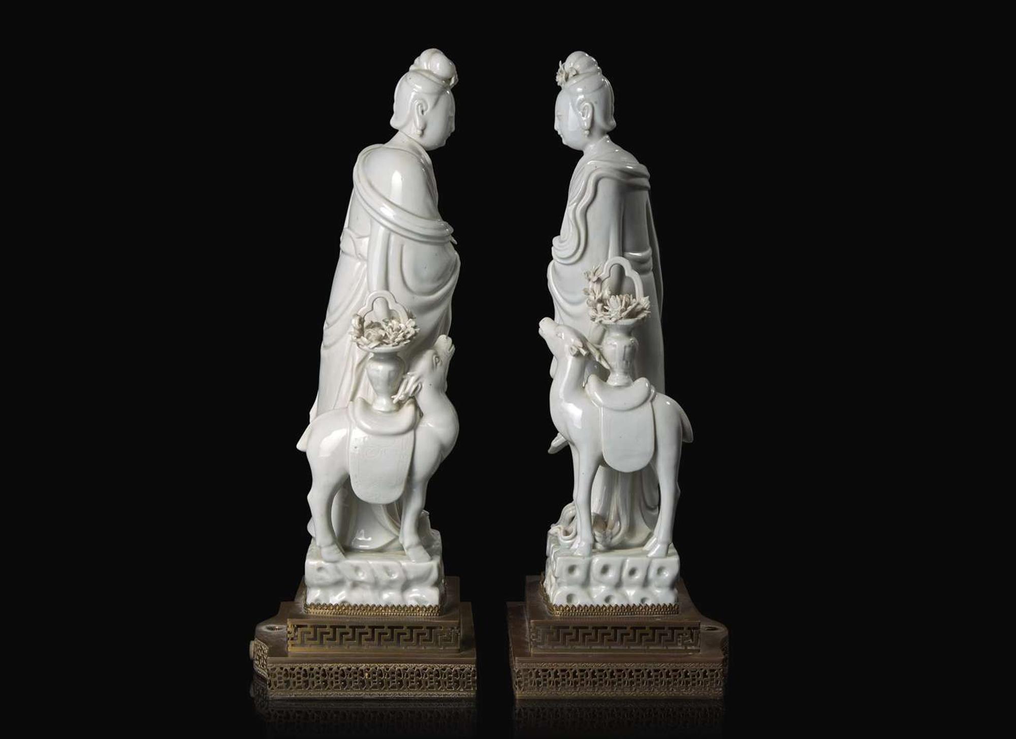 A pair of Chinese Blanc de Chine Figures of Meiren with Deer, Xu Yunlin Zhi impressed mark 德化窯仕女仙鹿瓷塑一對 許雲林製款