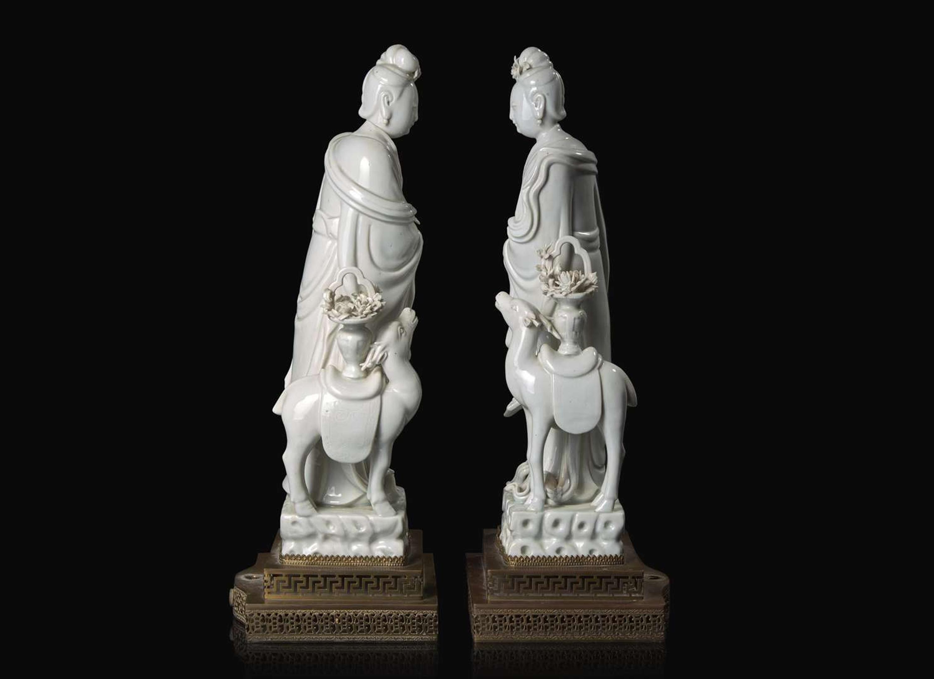 A pair of Chinese Blanc de Chine Figures of Meiren with Deer, Xu Yunlin Zhi impressed mark 德化窯仕女仙鹿瓷塑一對 許雲林製款