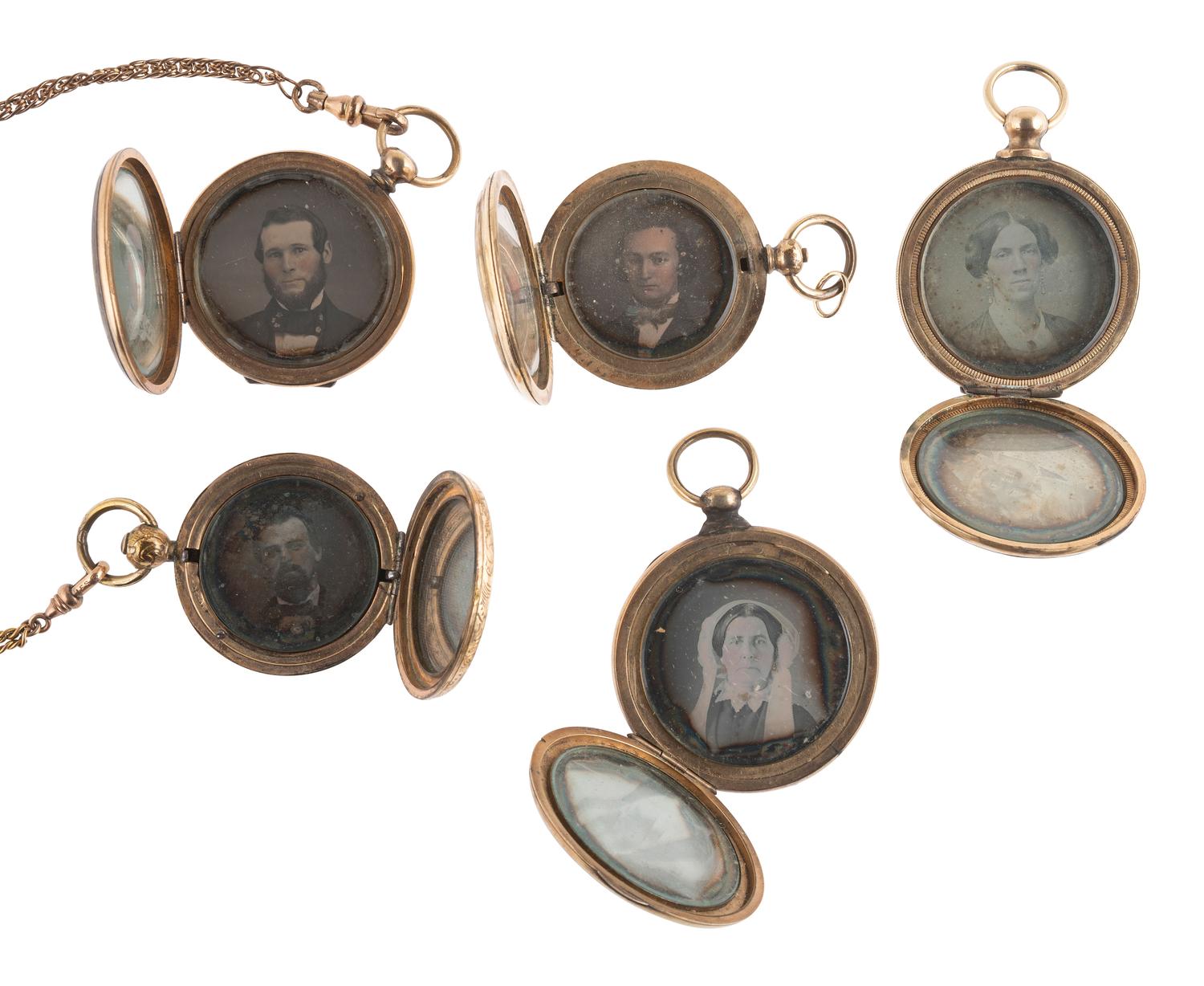[EARLY PHOTOGRAPHY]. 18 daguerreotypes housed in 9 lockets.
