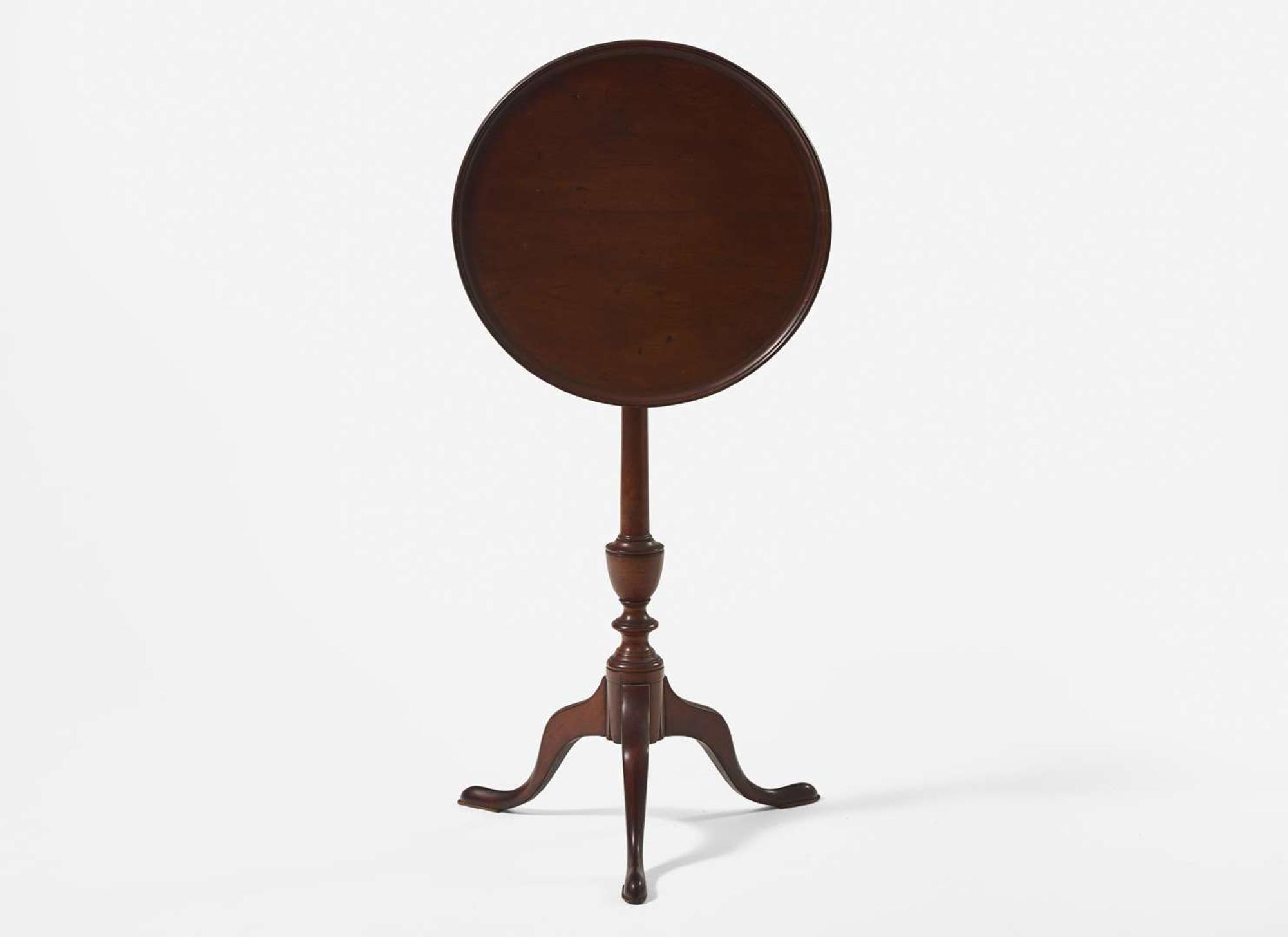 A Federal carved cherry tilt-top candlestand, circa 1800