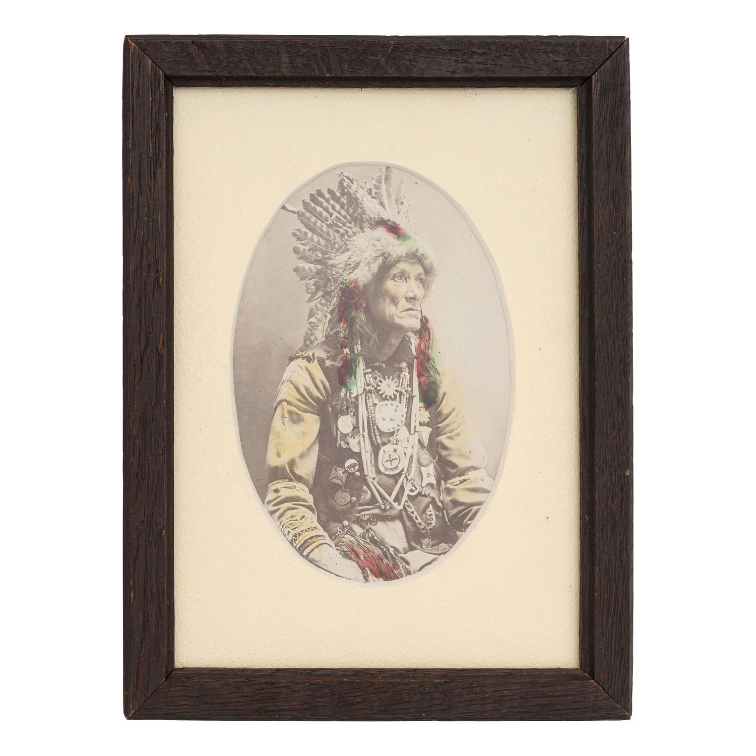 [NATIVE AMERICANS]. Portrait of Native American chief. N.p.: [F.J. Haynes], [ca 1901].