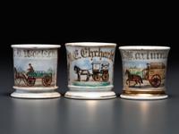 Three Porcelain Occupational Shaving Mugs with Horse-Drawn Carts