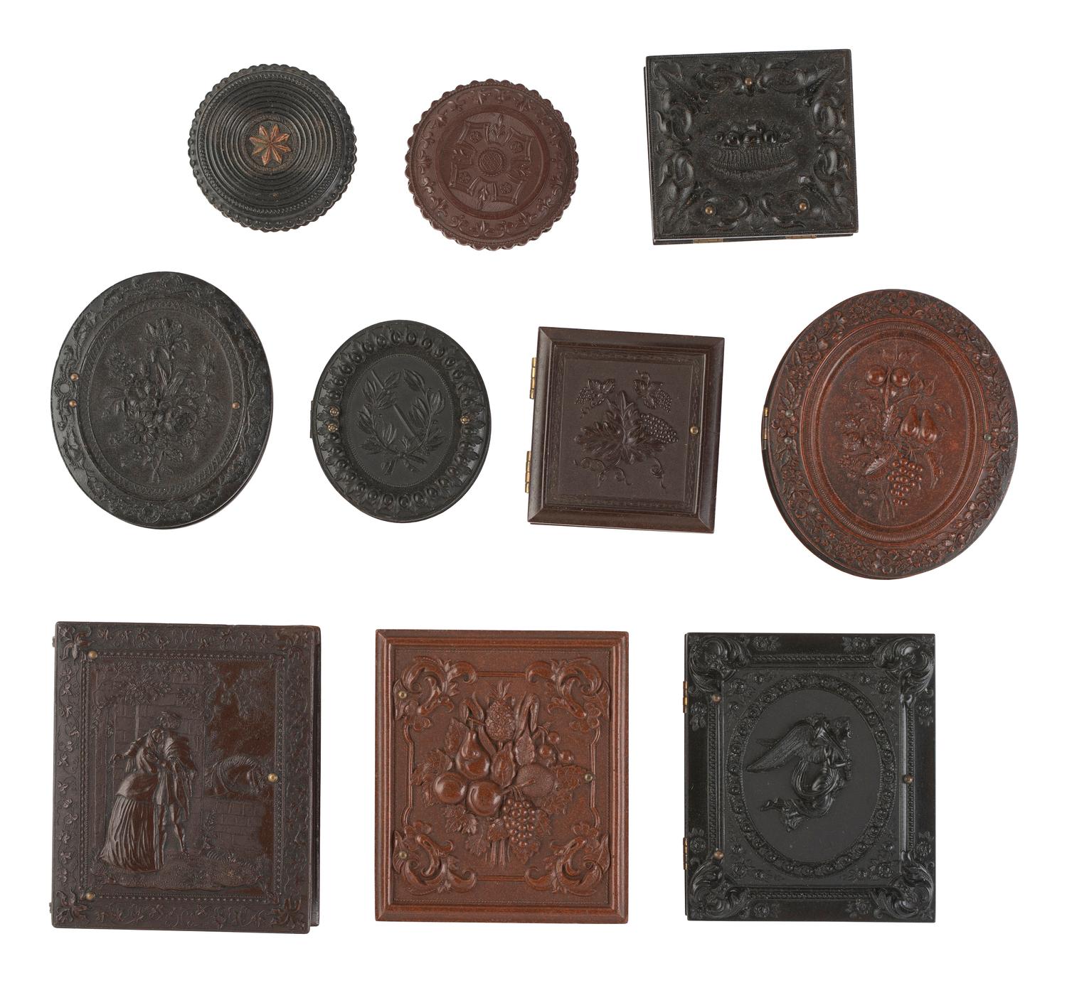 [EARLY PHOTOGRAPHY]. A group of Union cases and collar boxes with varying designs.