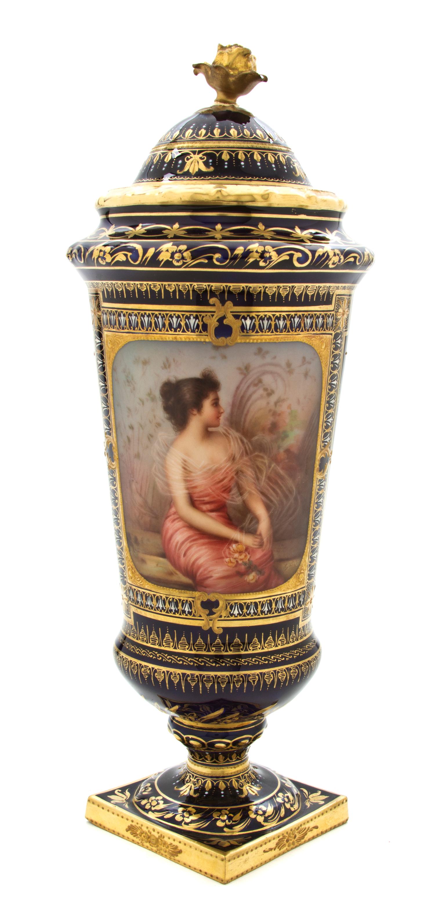 A Sevres Style Porcelain Lidded Vase, Height 11 inches.