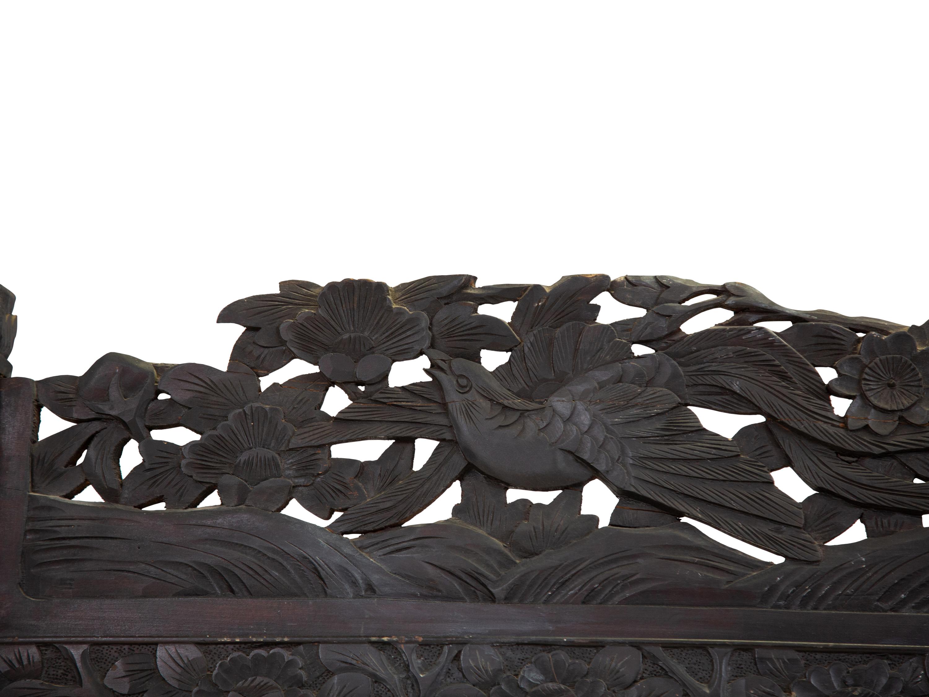 A Japanese Carved Hardwood Two-Panel Screen