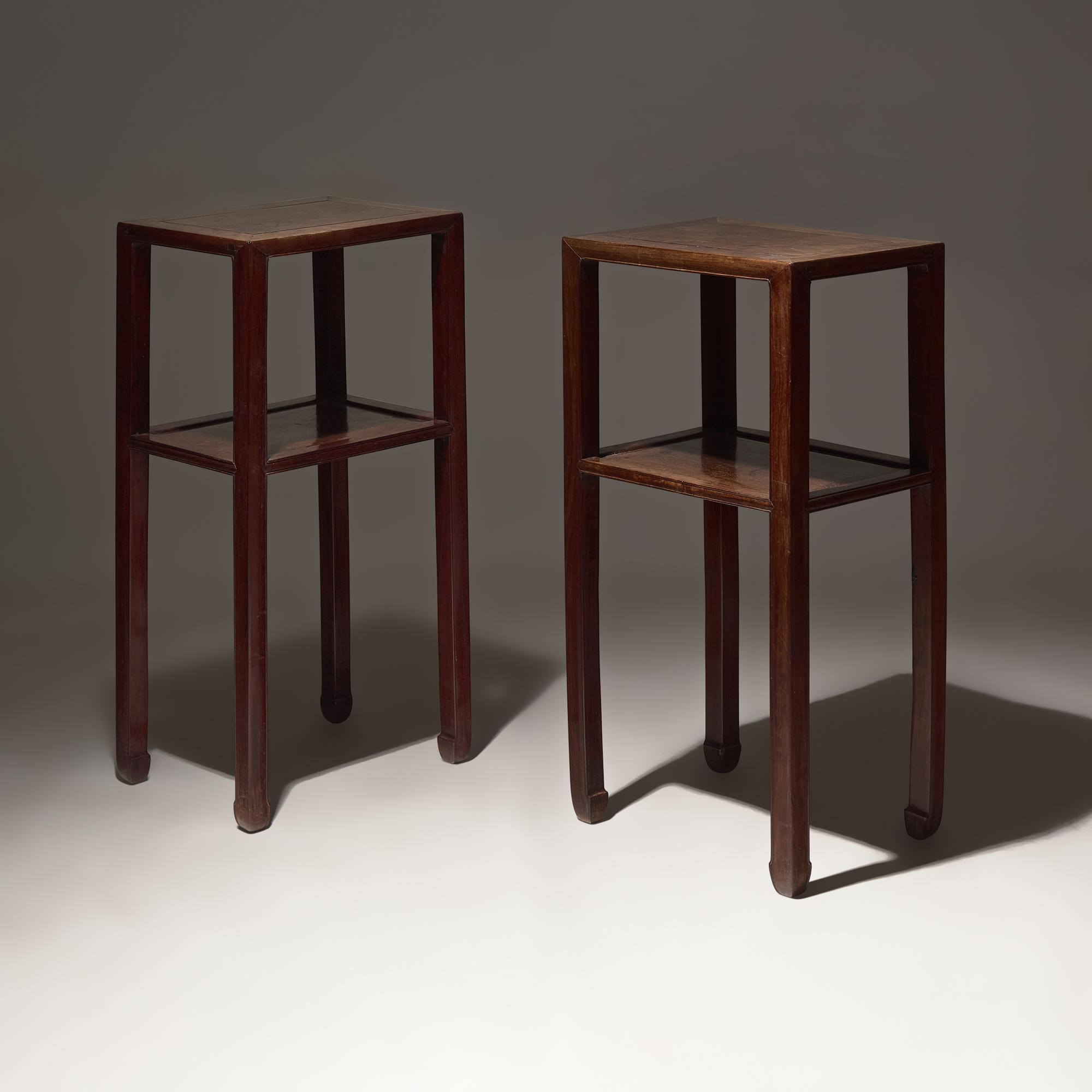A Pair of Chinese Hardwood, Possibly Huanghuali, Stands, Qing Dynasty, 18th Century — 清中期 或爲黃花梨邊几一對