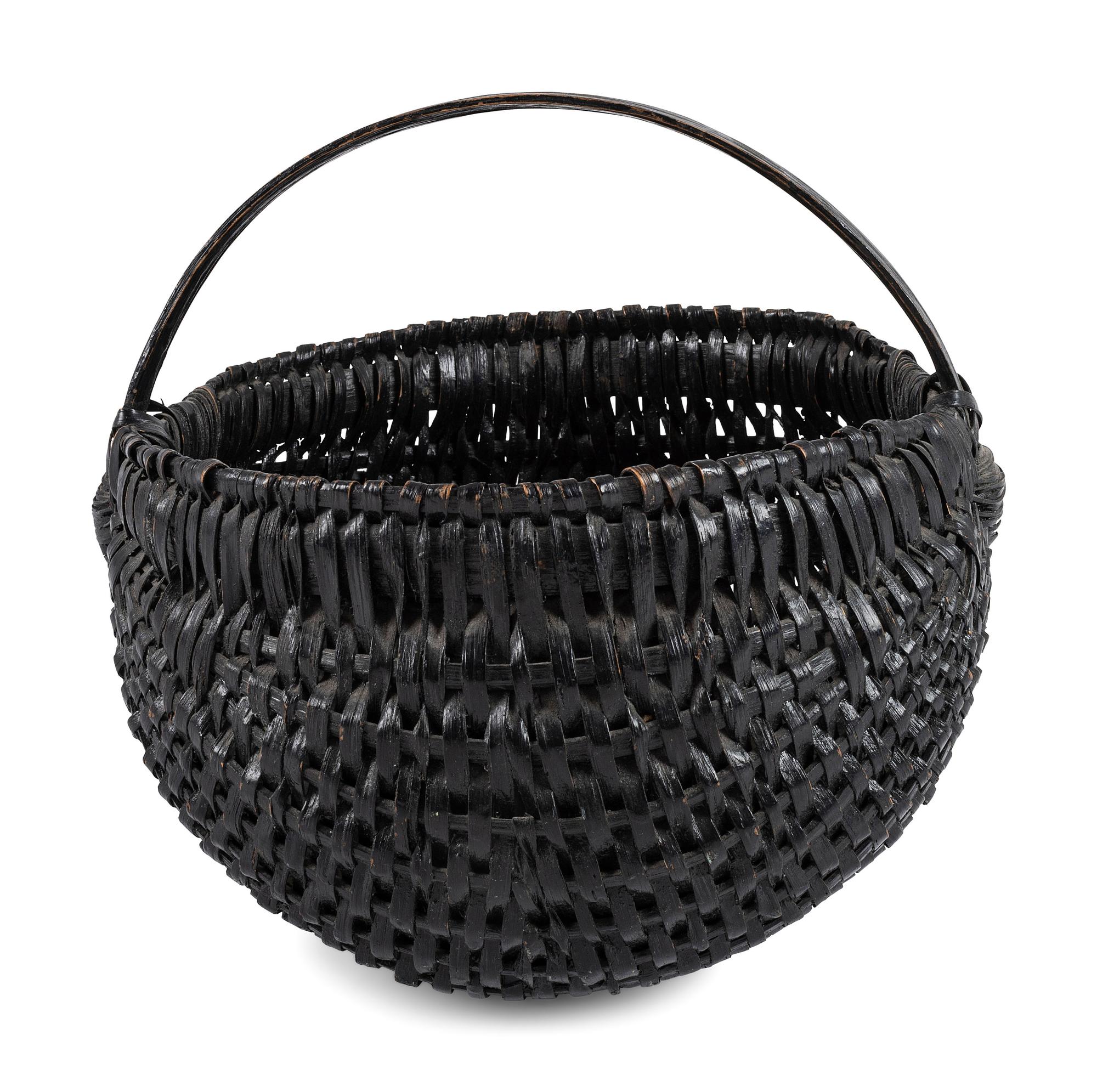 A Woven Buttocks Basket in Black Paint