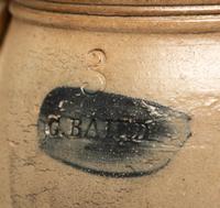 Two Ovoid Stoneware Crocks or Churns